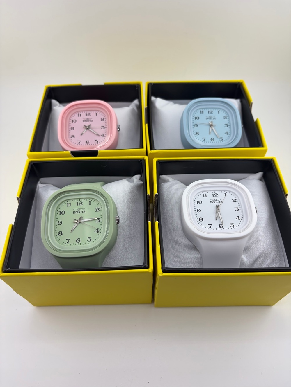Invicta lot of 4 Watches in Pink, Blue, Green & White